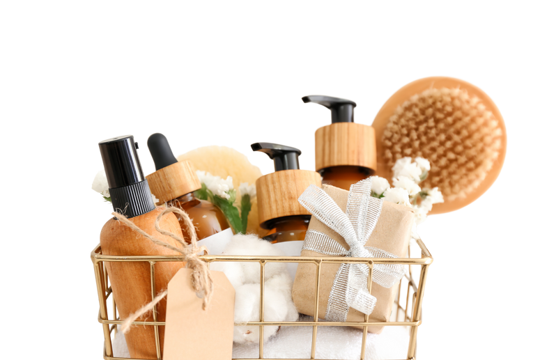 a basket filled with beauty products on a white background